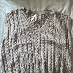 grey sweater vest